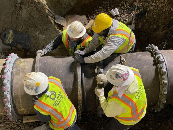 Crews install new pipe