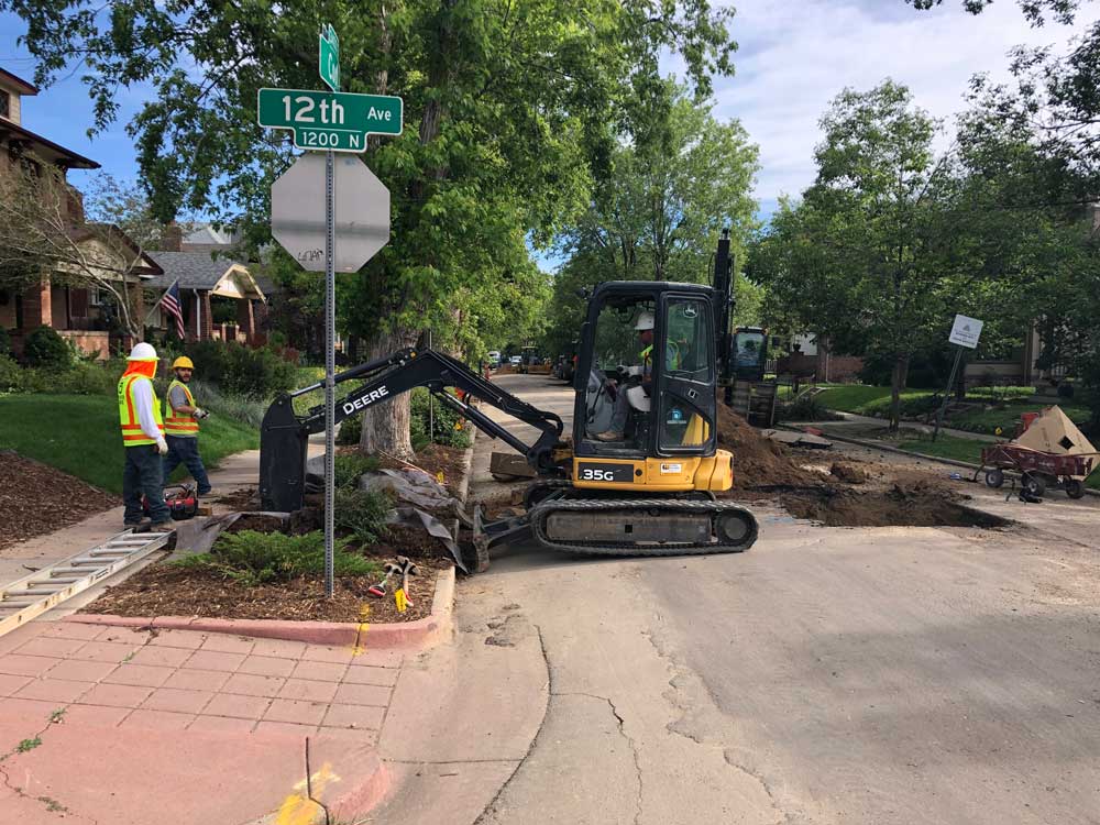 Denver Water work crew digs up lead service lines