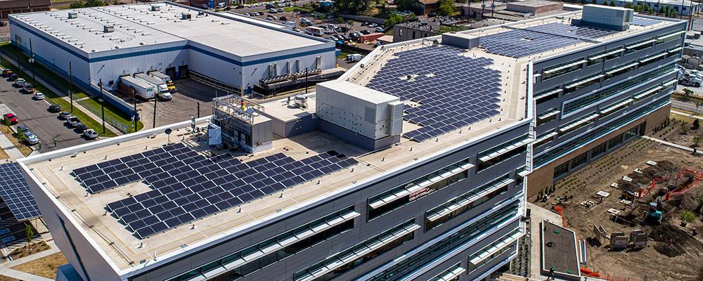 Aerial view of solar panels atop Denver Water's administration building. 