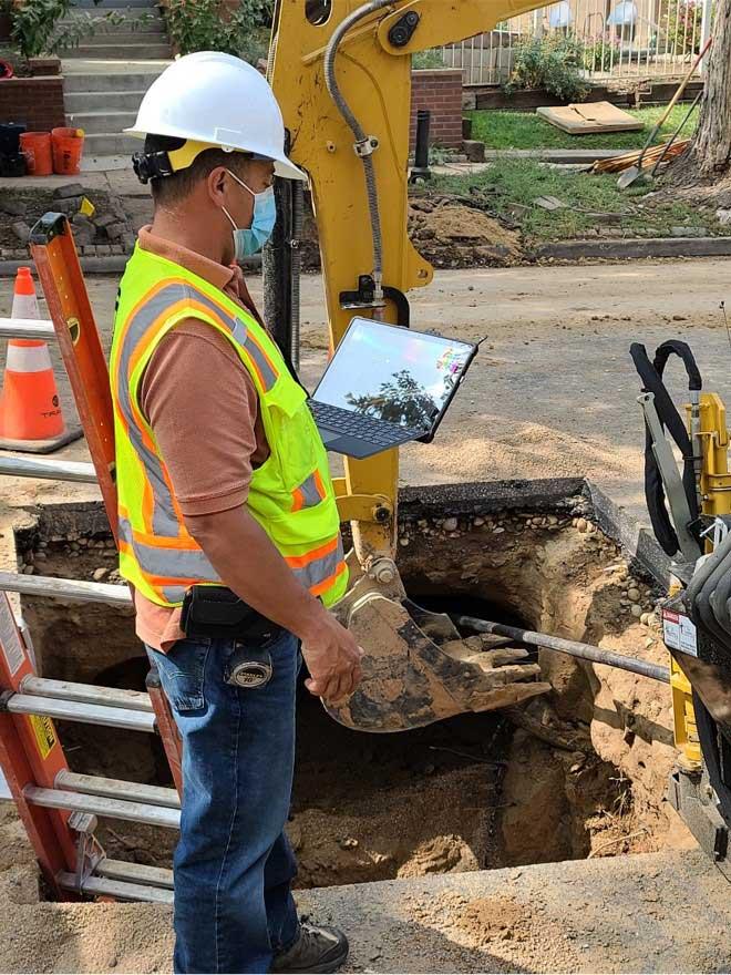 Worker tracks work involved in replacing lead service line