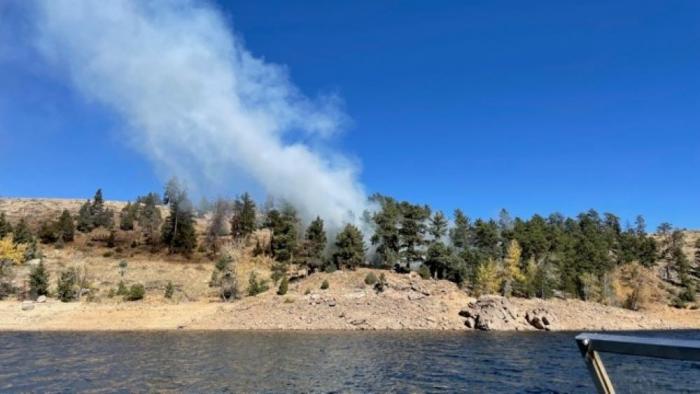 Smoke from the shore of Gross Reservoir
