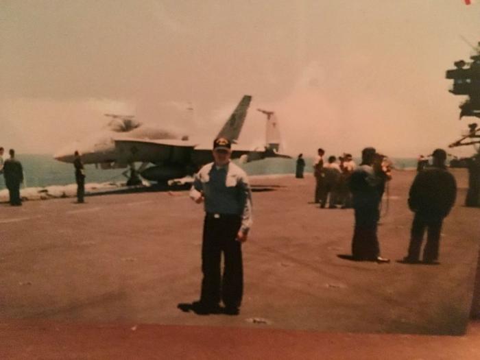 Tolmich on the ship's flight deck