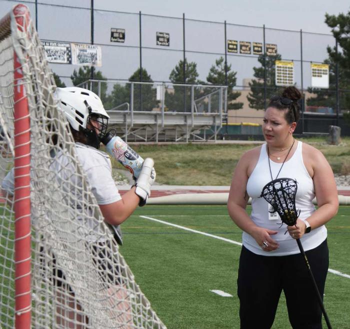 Lacrosse goalie and coach