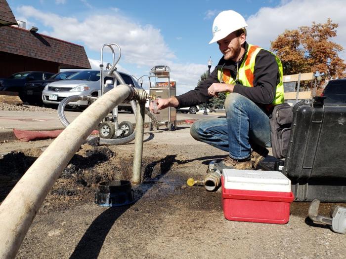 Man tests water in new pipe