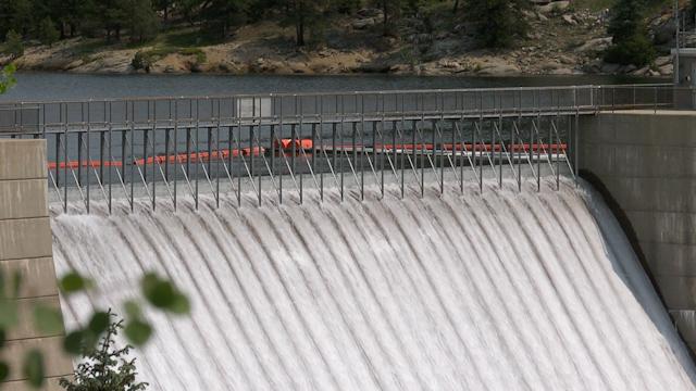 Close-up of water spilling down a dam