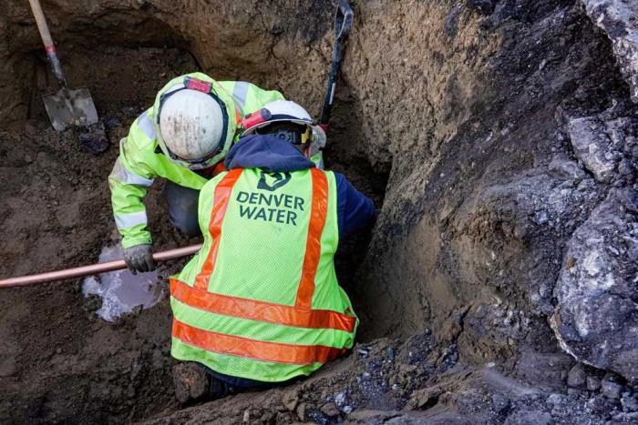 Denver Water crew replaces lead service line with new copper line. 
