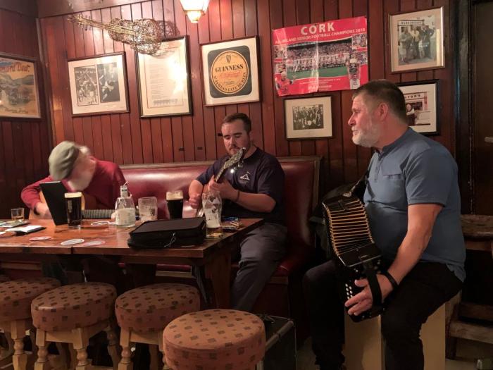 Callum McCarthy playing music in Ireland bar