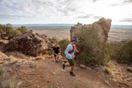 Bryan Frazier climbs a hill in the trail marathon 