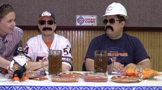 Three Chicago Bears fans sit together
