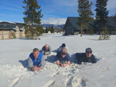 Winter Park crew planking in the snow.
