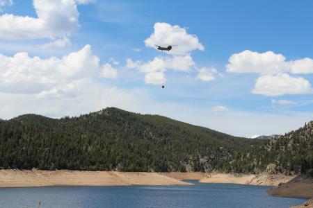 Over the weekend of May 6 and 7, the Colorado National Guard conducted annual wildland firefighting training , including aerial operations and bucket drops.