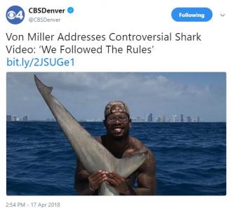 CBS4 Denver shows Denver Broncos linebacker Von Miller holding a Hammerhead shark during a recent fishing trip to Florida. 