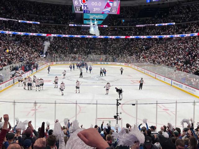 Hockey players on the ice, fans celebrating a win, Colorado Avalanche 8, Edmonton Oilers 6, on May 31, 2022. 