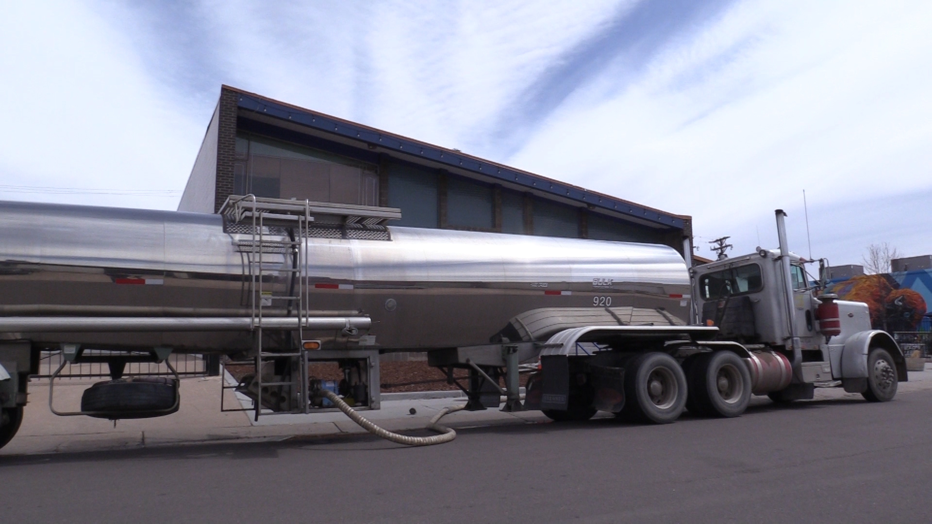 A tanker truck delivers 4,000 gallons of purified water to Declaration Brewery.