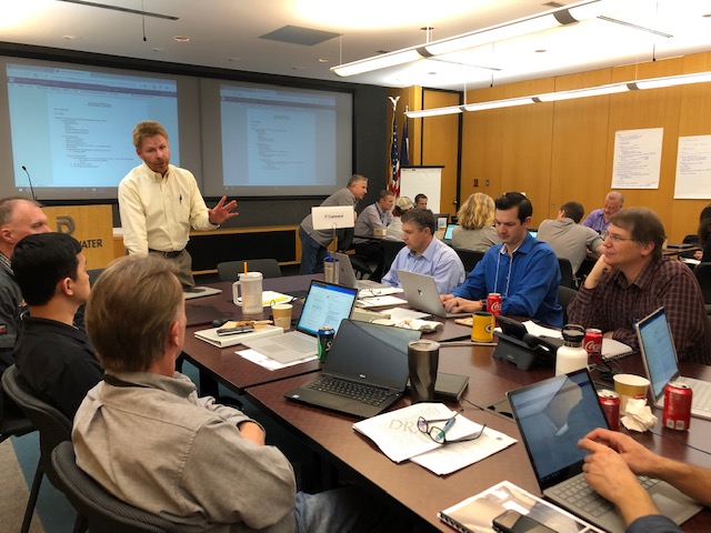 Denver Water's emergency management team discusses how to respond to a scenarios created in a recent cybersecurity exercise. Photo credit: Denver Water.