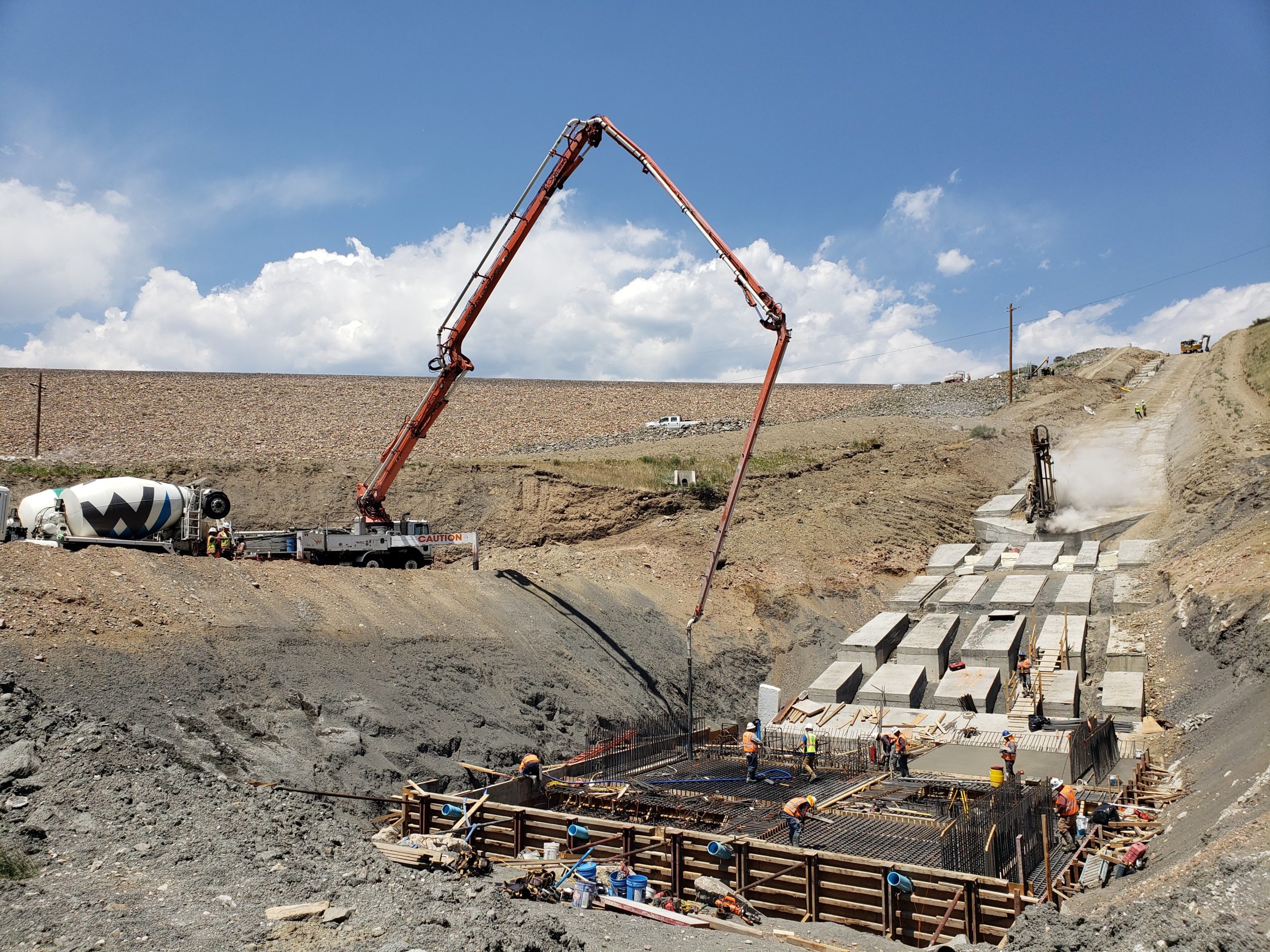 Pouring concrete for the new spillway at Ralston Dam, replacing the original one built in the 1930s. Photo credit: Denver Water.