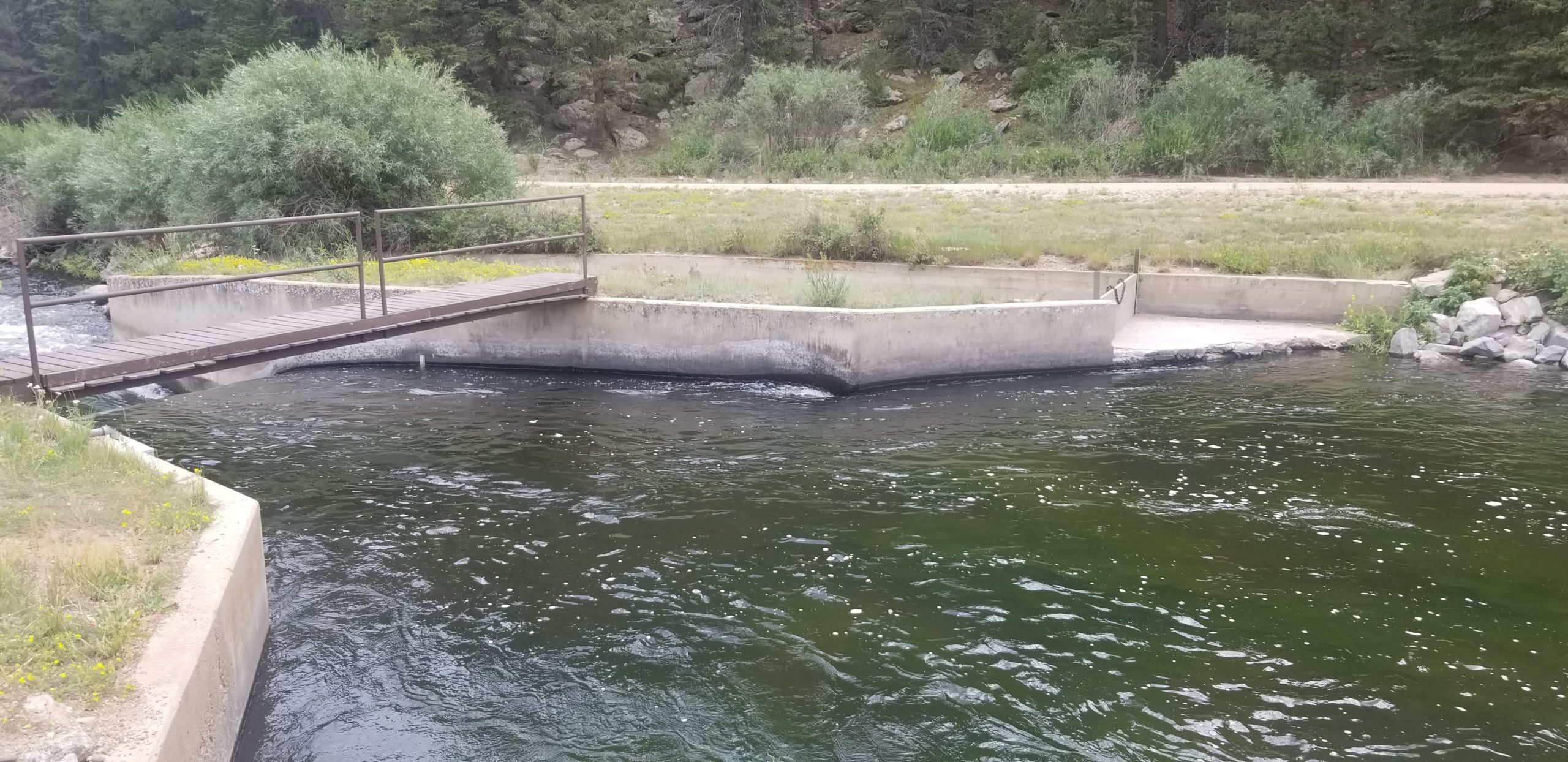 Eleven Mile Canyon Dam's original flume was often inundated in high-water years and was unable to provide accurate water flow measurements. Photo credit: Denver Water. 