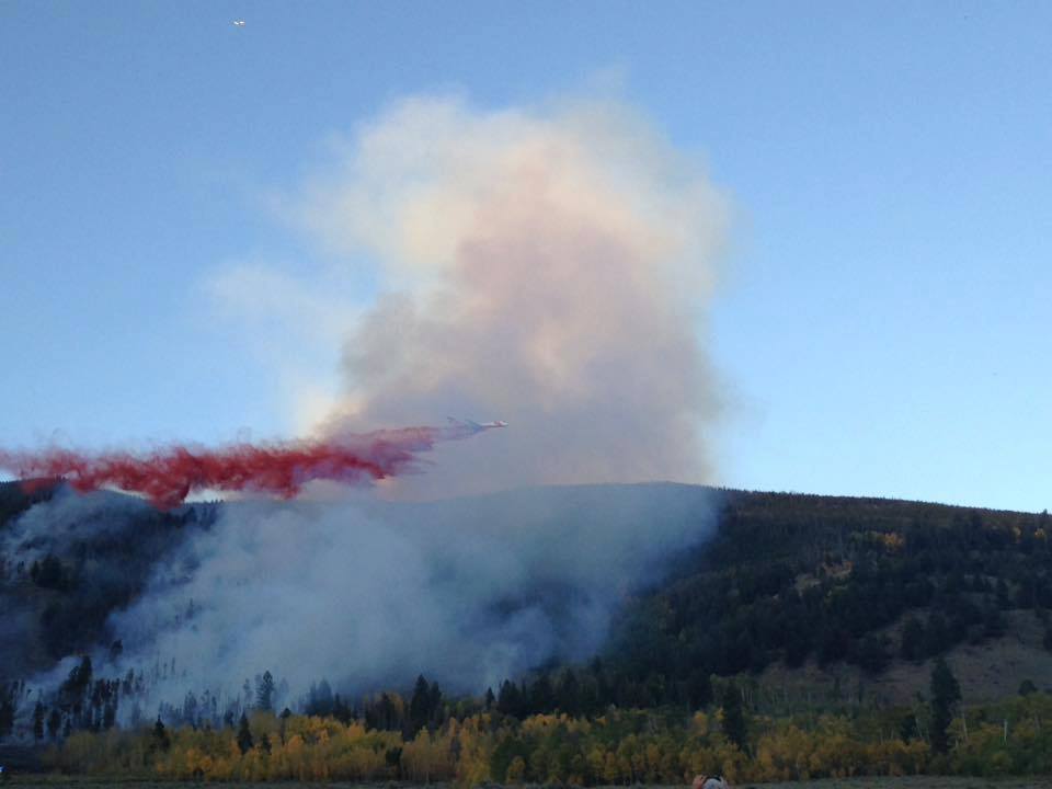 An air tanker drops slurry on the Tenderfoot 2 wildfire in Summit County.