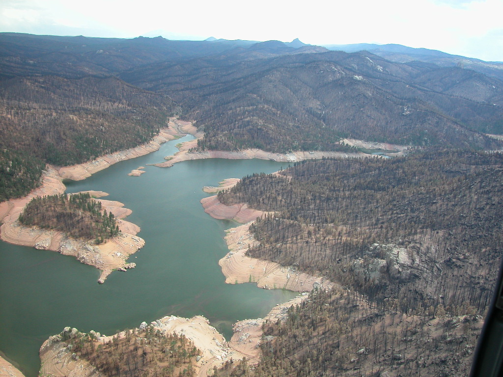 The devastation following the Hayman Fire, coupled with the crippling effects of a severe drought, stretched as far as the eye could see in this aerial image of Cheesman Reservoir taken in August 2002.