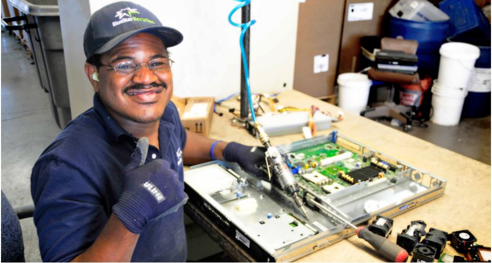 Recycling electronics can be hard and repetitive. Blue Star employees take pride in their important work.