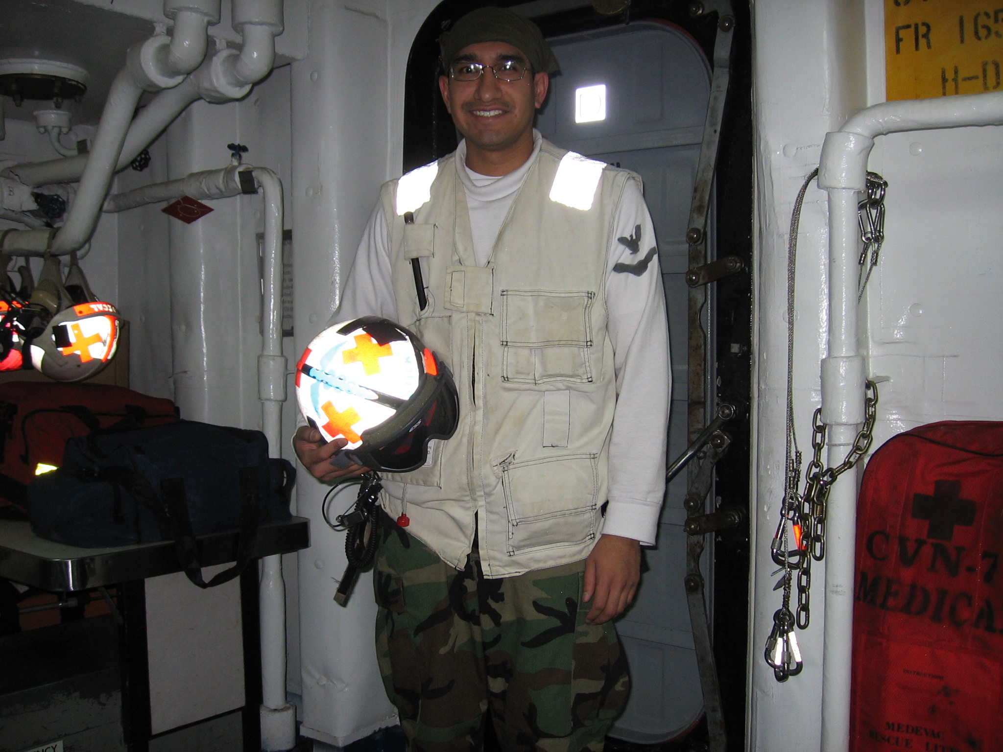 Montez in the flight deck battle station of the USS Theodore Roosevelt during Operation Iraqi Freedom.