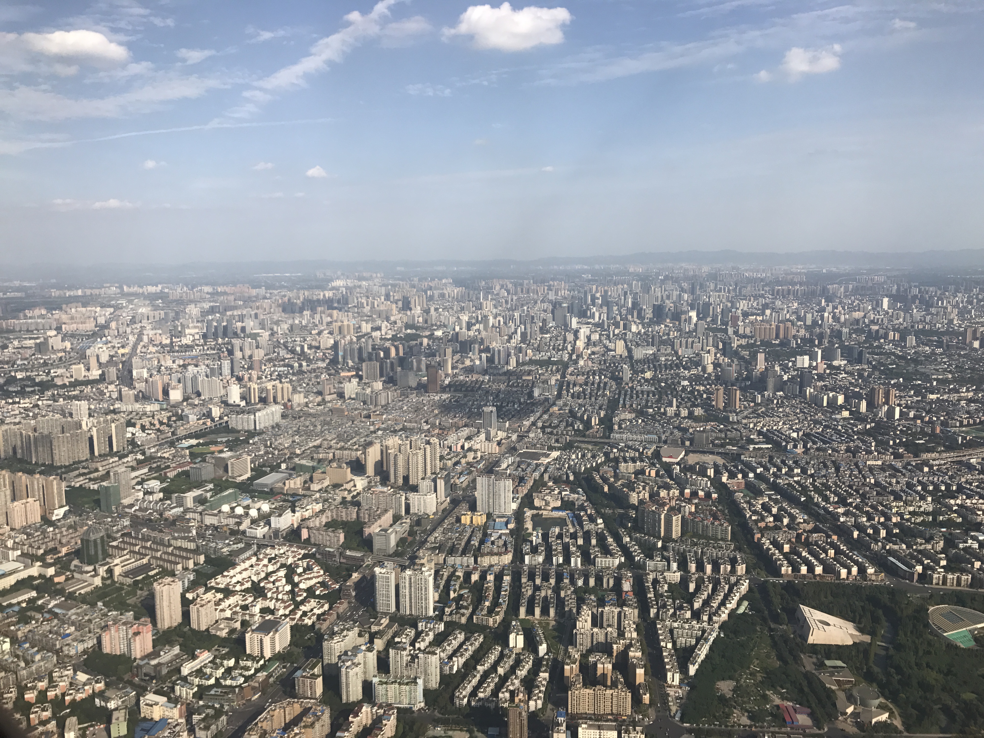 A view from the sky shows the dense, expansive growth in just one part of the megacity of Chengdu, China. It is in response to this growth, the Chinese government is interested in introducing a bond market to help fund massive infrastructure projects.