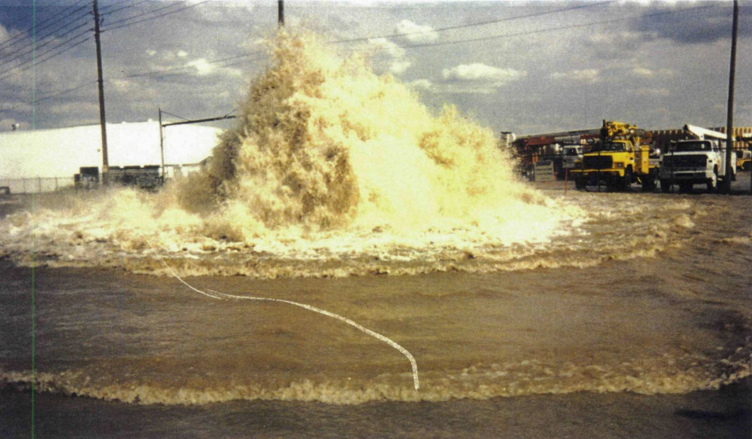 The north Denver water pipeline ruptured at East 56th Avenue. and Quebec Street. in 1997. Photo credit: Denver Water.