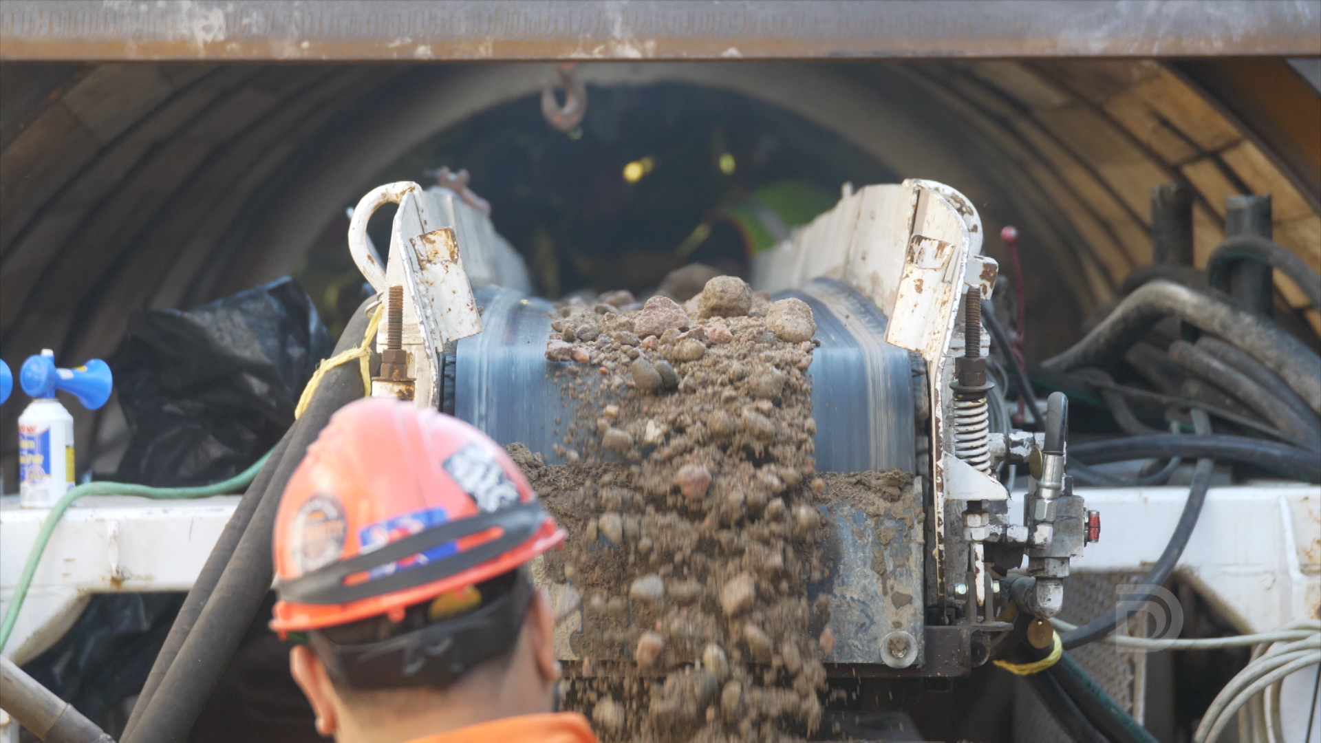 A tunneling machine removes debris from the I-70 tunnel. Crews can dig 40 to 60 feet per day with good conditions.