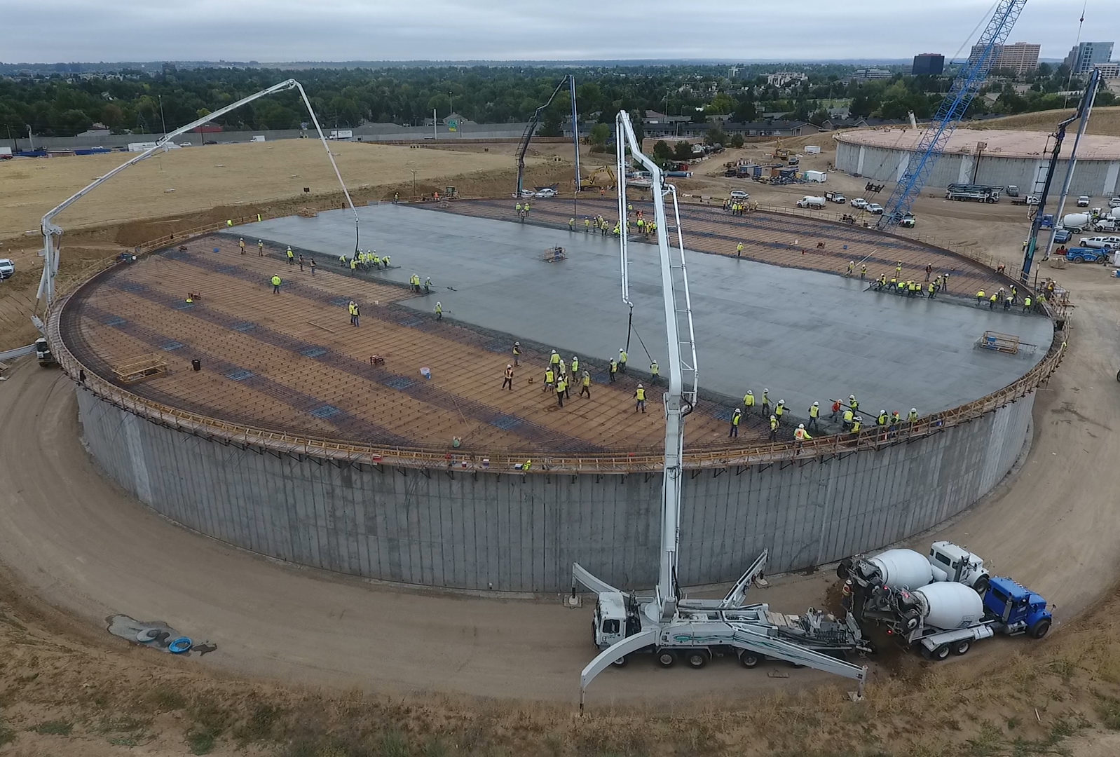 Crews place the concrete roof deck on a new, 15-million-gallon water storage tank at Hillcrest on Sept. 16, 2017.