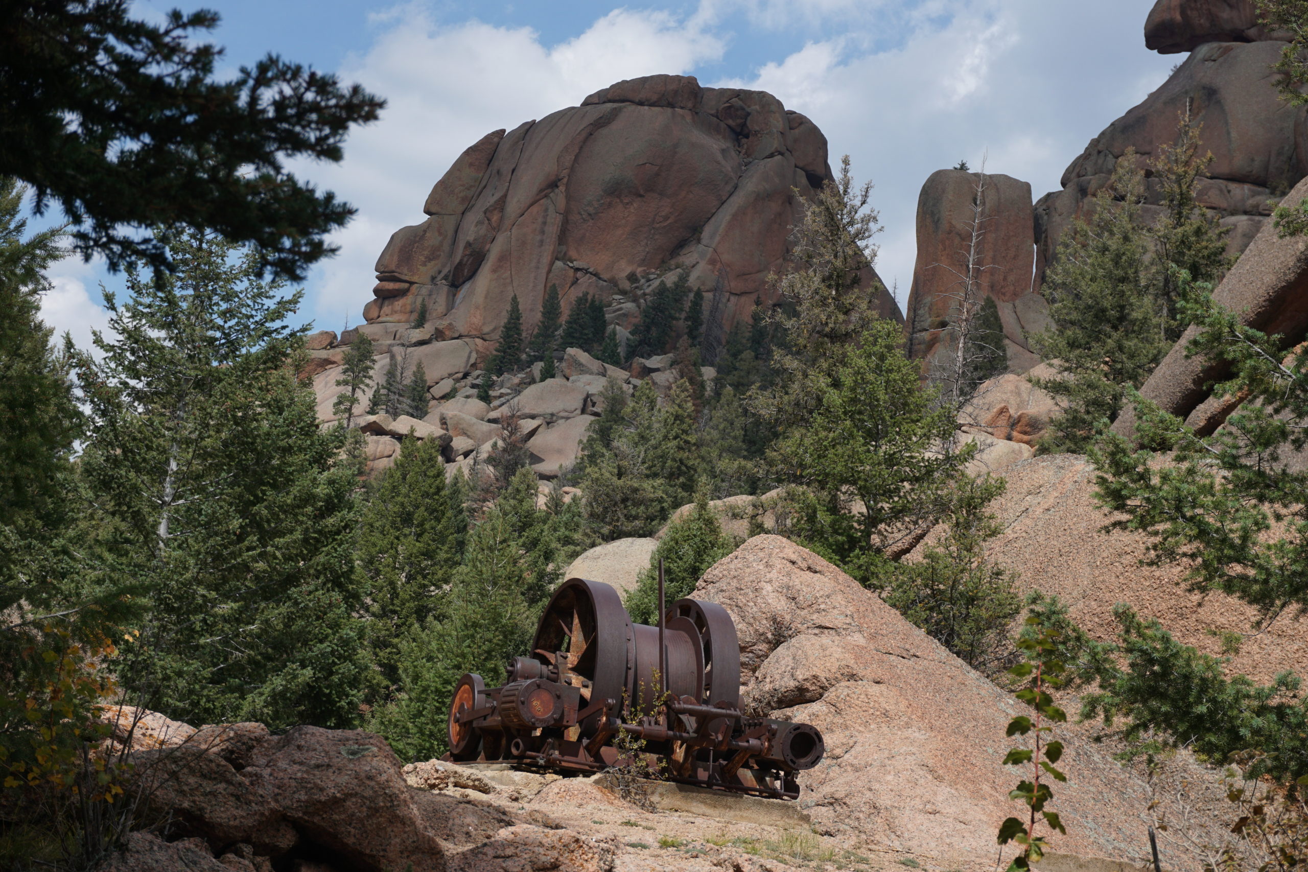 The only remains of a shafthouse that once lowered men into the mysterious rocks below. Photo credit: Denver Water.