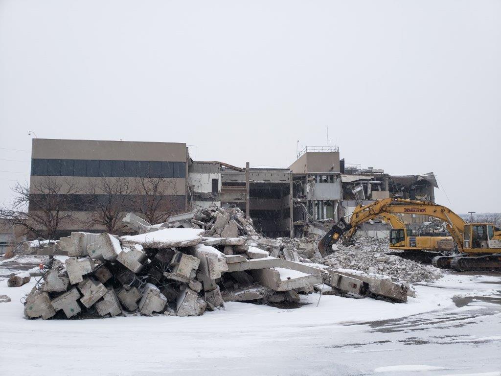 Demolition debris from Denver Water's old administration building is sorted for recycling.