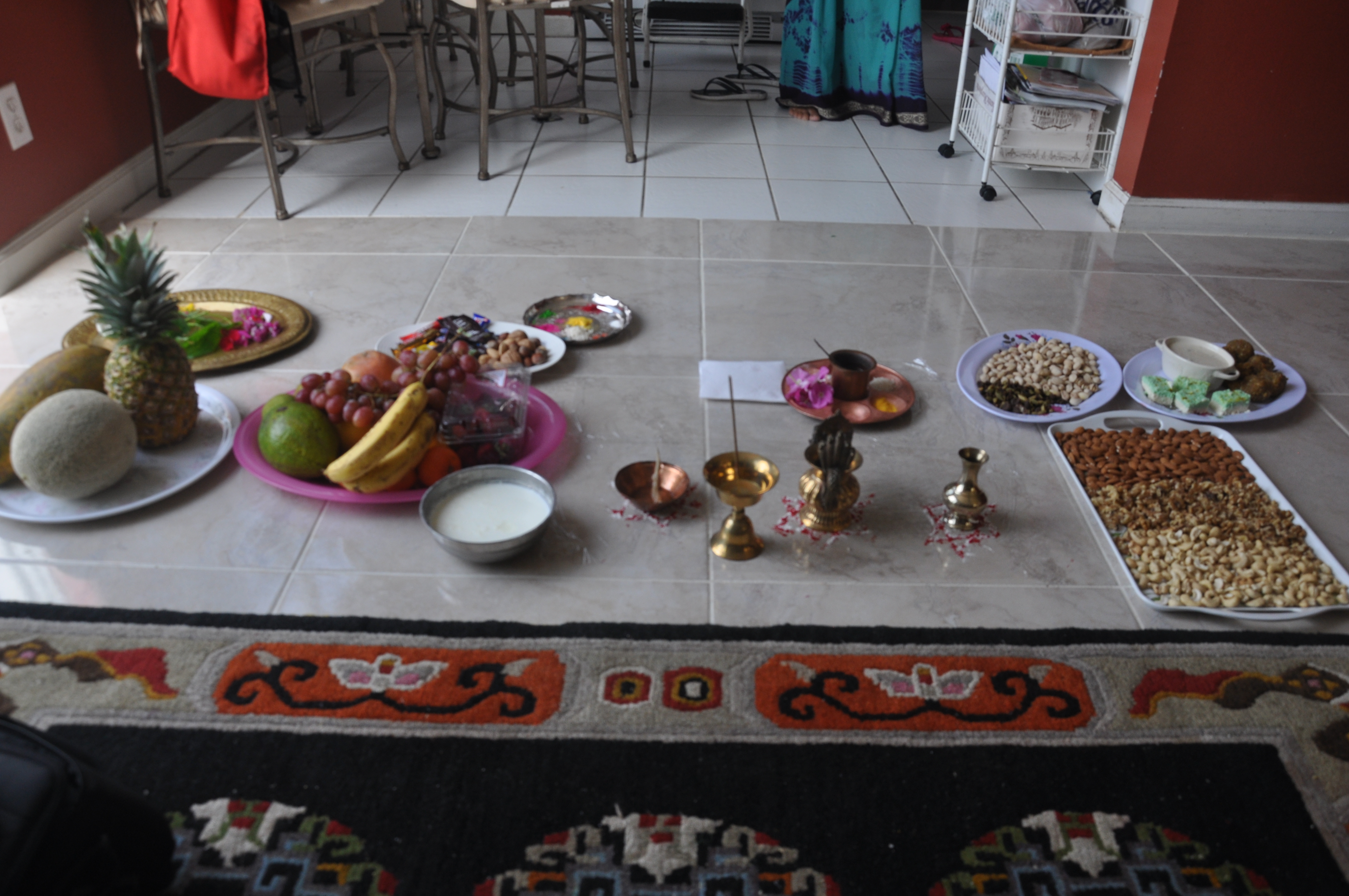 Oil, water, colored powders, sweets, nuts and other food are laid out for the ceremony honoring siblings on the fifth day of Tihar, also known as Diwali. Photo credit: Usha Sharma.
