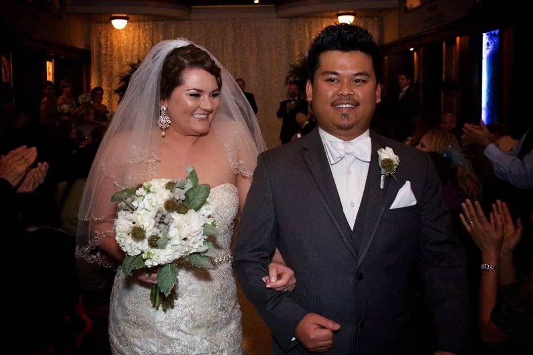 Dennis Kouanchao and his wife Kali on their wedding day