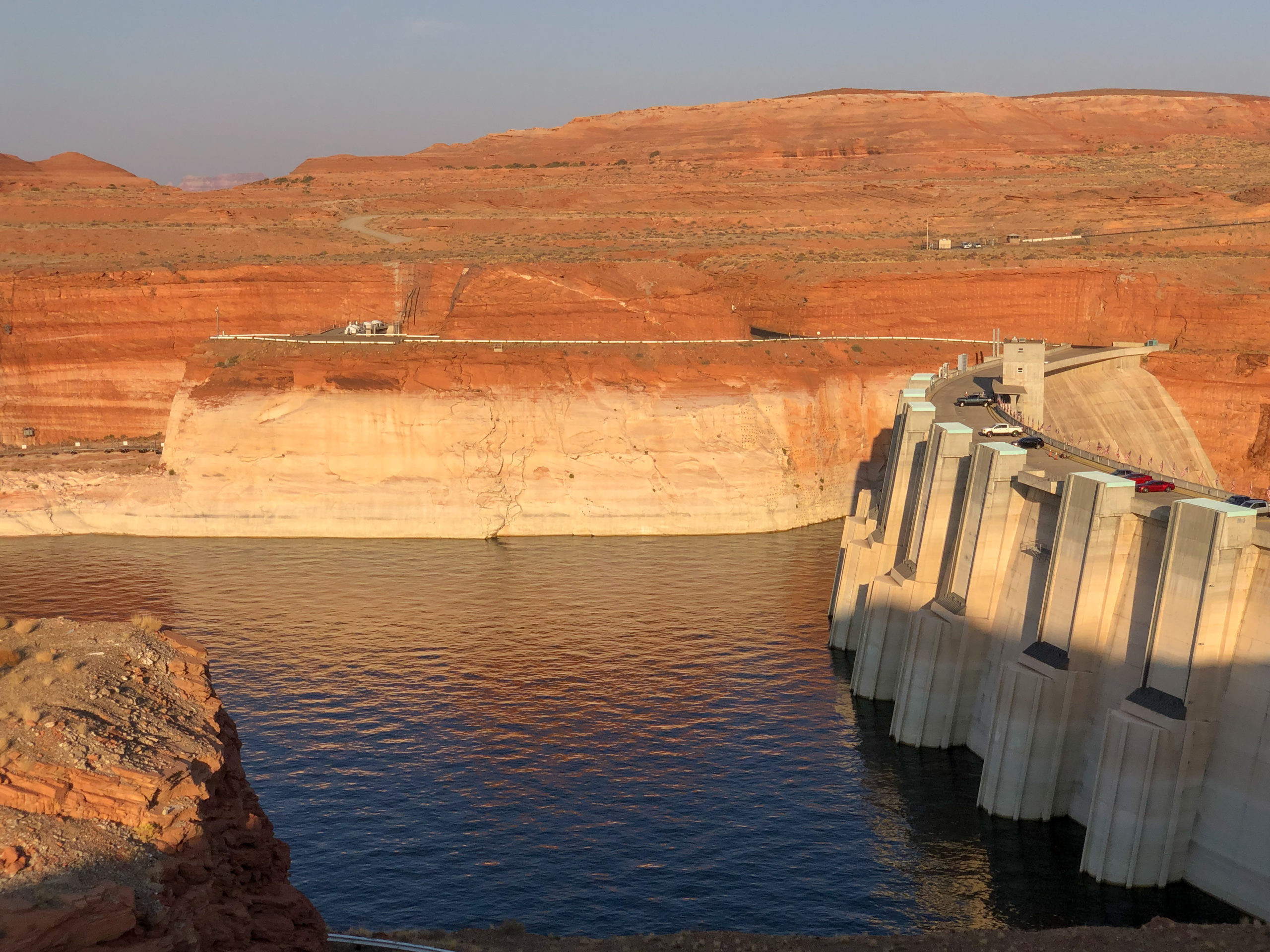 This picture of Glen Canyon Dam from Sept. 23 shows the “bathtub ring” around Lake Powell’s sandstone canyon walls. The ring was created by mineral deposits when the lake was at higher elevations. The distinct line in the rock is a clear reminder of how far water levels have fallen since 2000. Photo credit: Denver Water.