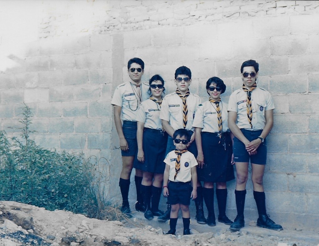 Jose Salas, the youngest child at the center of the picture, and his five older brothers and sisters were part of the local chapters of Boy Scouts and Girl Scouts in Mexico. Photo credit: Jose Salas.