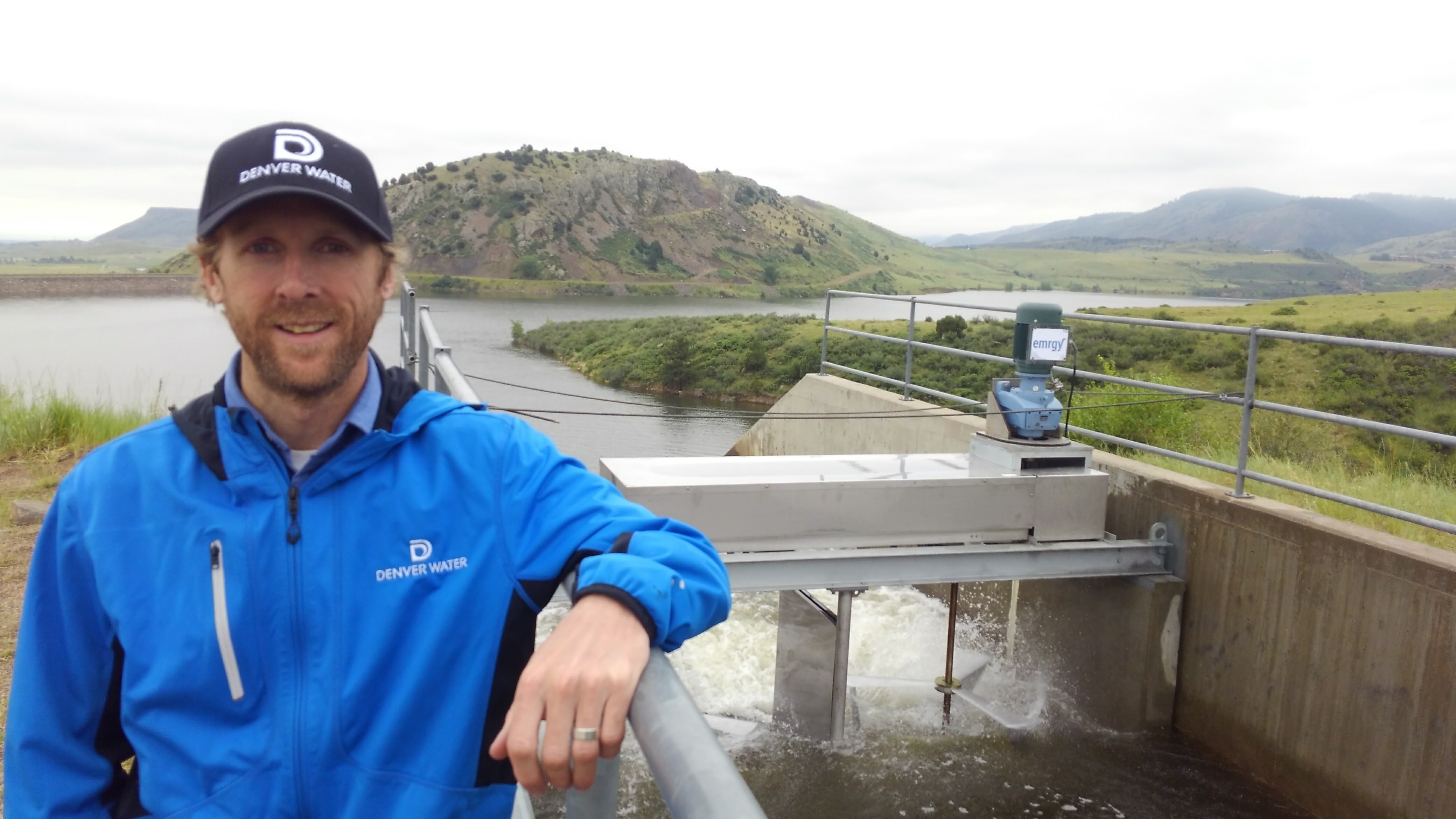 Ian Oliver, Denver Water's project manager for the Emrgy pilot study, in front of the first installed turbine along South Boulder Canal.