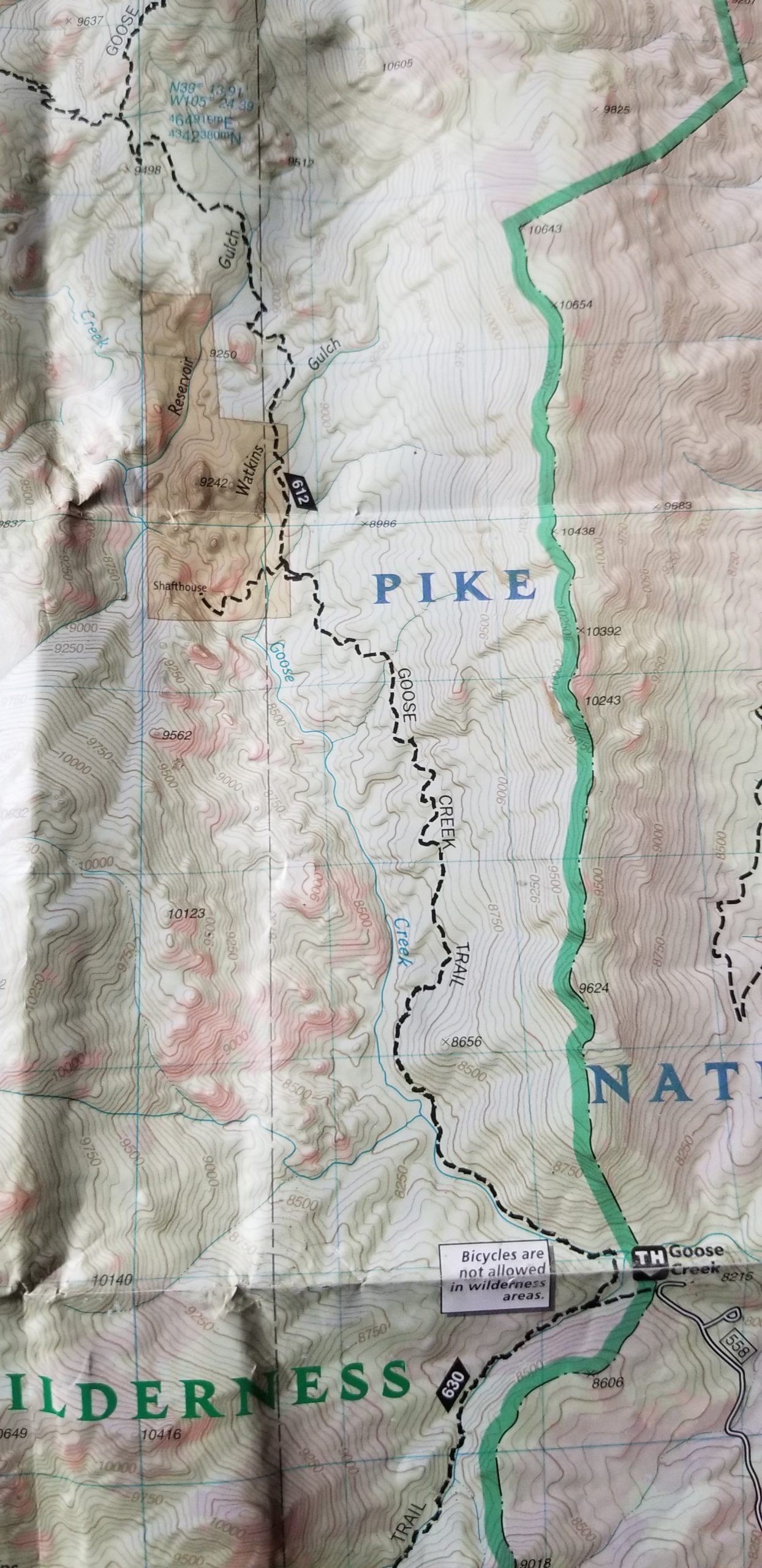 A topographic map shows the trail to the old cabins in Lost Creek Wilderness.