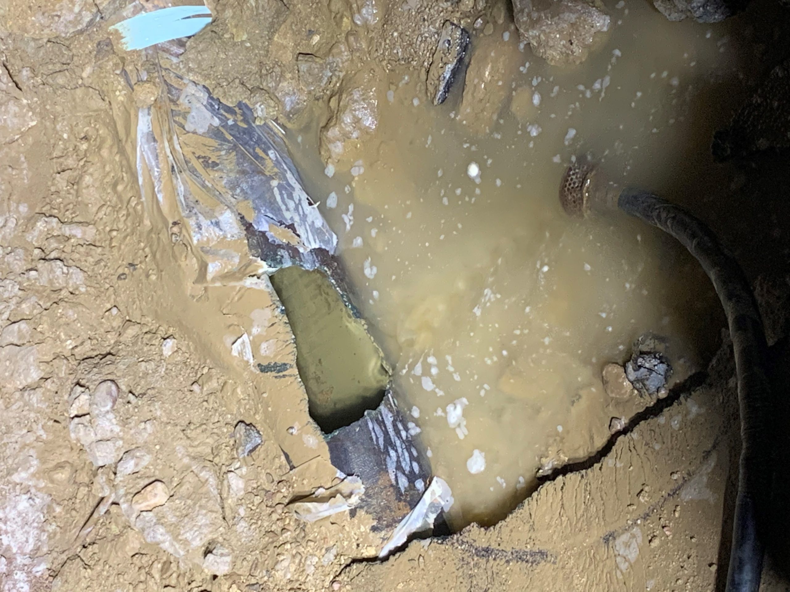 The force of the water ripped out a 2-foot long section of the ductile iron pipe. Photo credit: Denver Water.