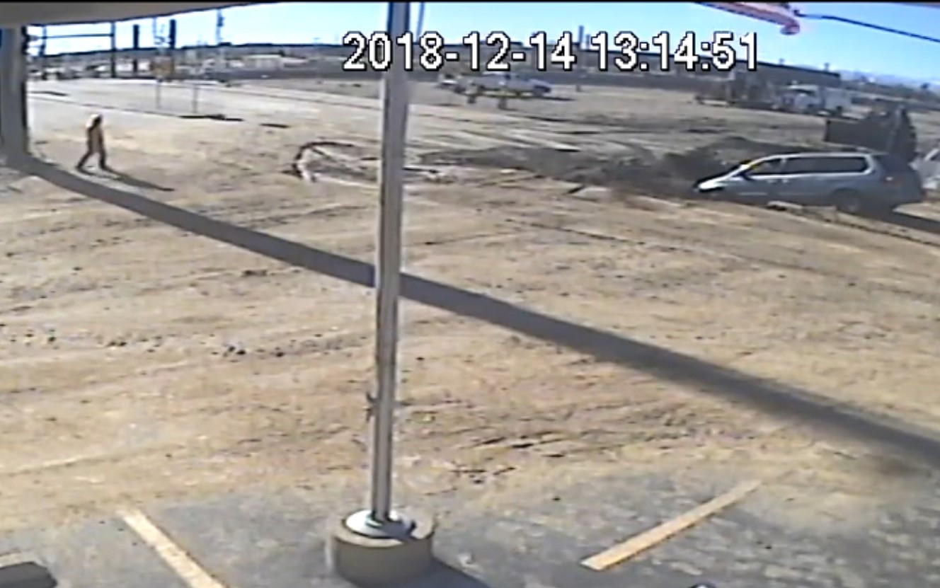 Security camera from AIS Industrial & Construction Supply at 39th Avenue and Ulster Street captures a vehicle going into a hole while Denver Water crews are repairing a main break in 2018. Video credit: AIS Industrial & Construction Supply.