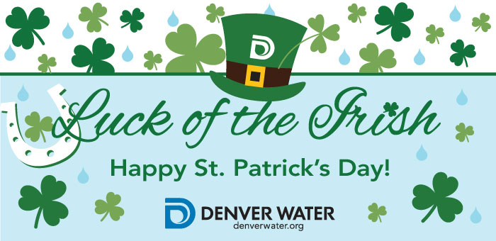 Green shamrocks shower down on a green hat with the Denver Water logo, with the words "Luck of the Irish" and "Happy St. Patrick's Day" under it.
