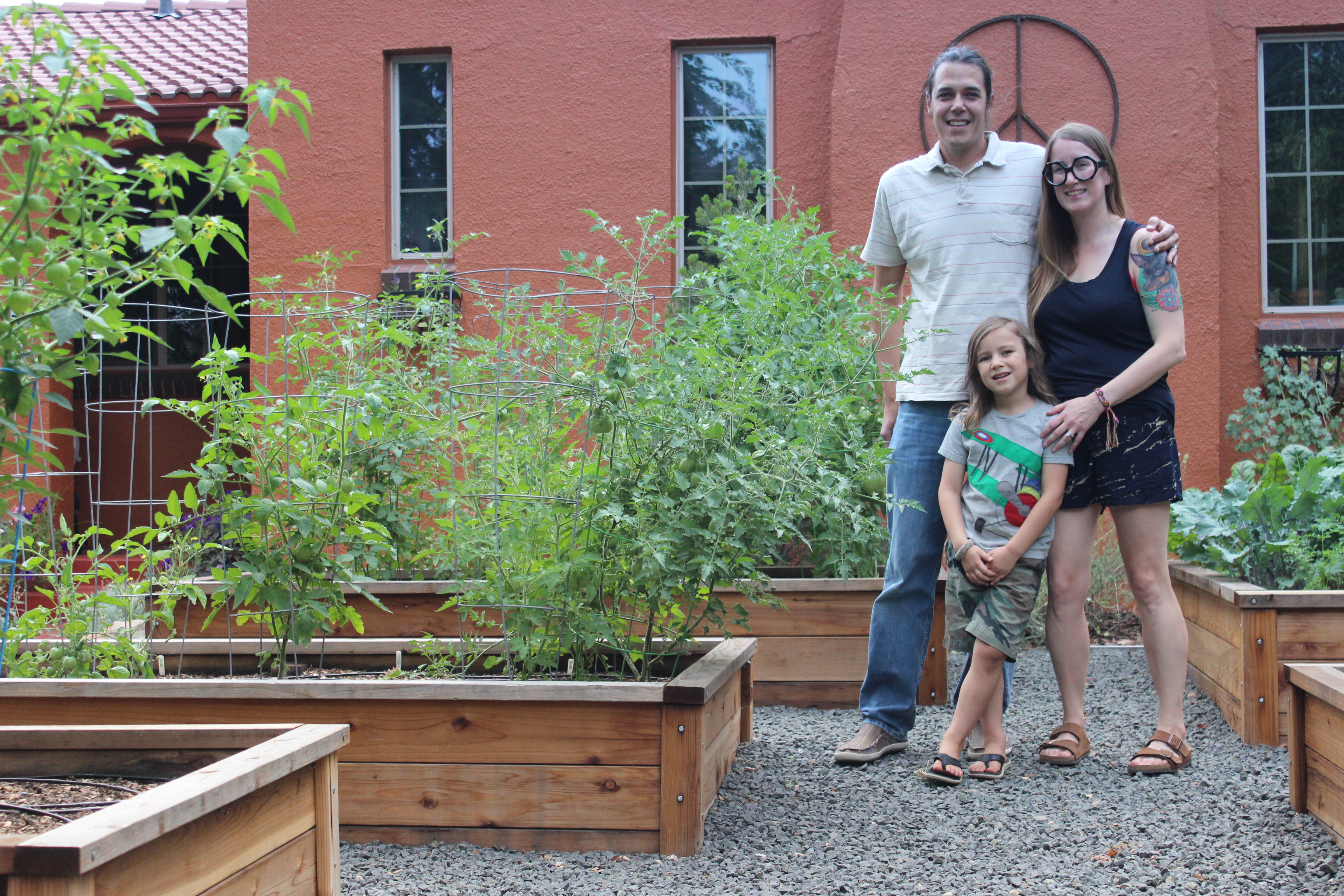 Ben Dinsmore and his wife, Tracy, and son, Soren, ditched their front lawn in favor of a vegetable garden after moving to Park Hill two years ago.