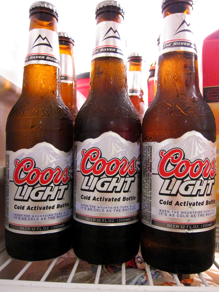 The Coors Light label reads, “When the mountains turn blue it’s as cold as the Rockies,” but that doesn’t mean it was brewed in the Rockies. Photo credit: Rob Nguyen, Flickr Creative Commons
