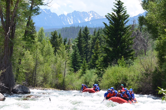 Whitewater rafting through the spectacular alpine scenery beneath The Eagles Nest Wilderness area on the Blue River. Photo courtesy of Performance Tours Whitewater Rafting. 