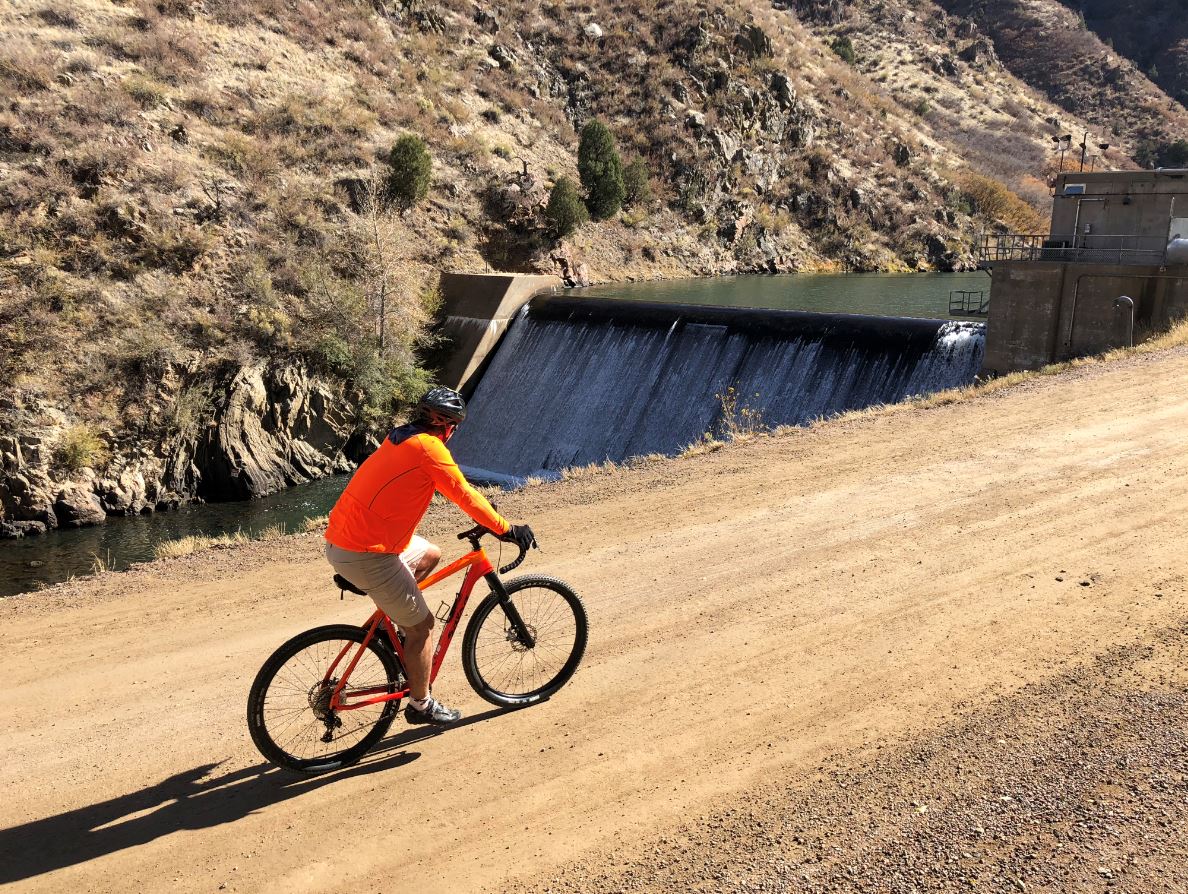 A man rides his bike through Waterton Canyon southwest of the Denver metro area. Waterton Canyon is Denver Water operations facility that is open for public recreation throughout the year. Because of its proximity to the metro area, Waterton Canyon welcomes thousands of visitors nearly every weekend in the summer. Photo credit: Denver Water.