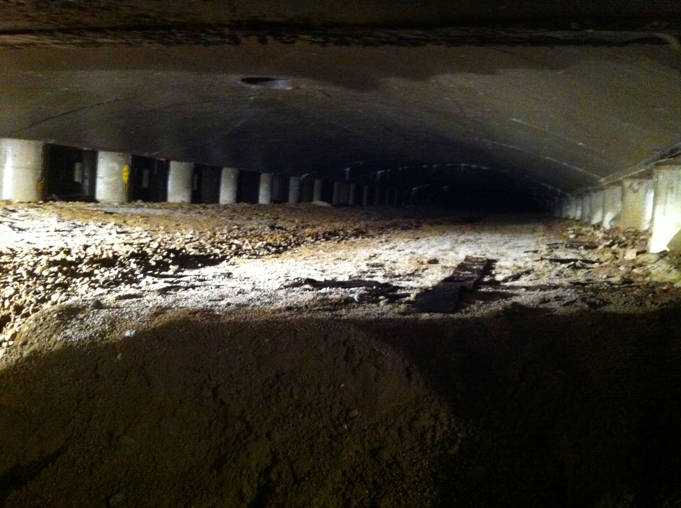 Underneath one of Hillcrest’s two old, concrete, treated water storage tanks in south Denver, which dated to the 1960s, before they were removed and replaced as part of a multi-year capital improvement program.